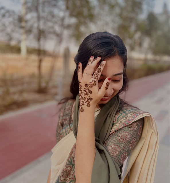 Guest henna on the hand, photographed outdoors in daylight